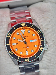SEIKO 5 SPORTS SRPD59K1 AUTOMATIC Orange Dial Diver Style “Orange Is The New Adventure.”